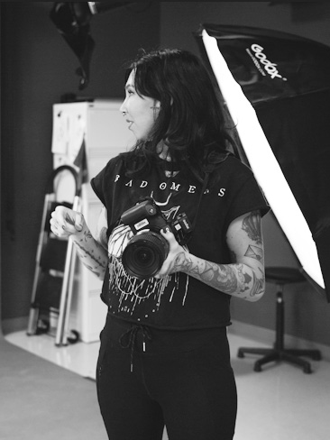 girl holding camera directing